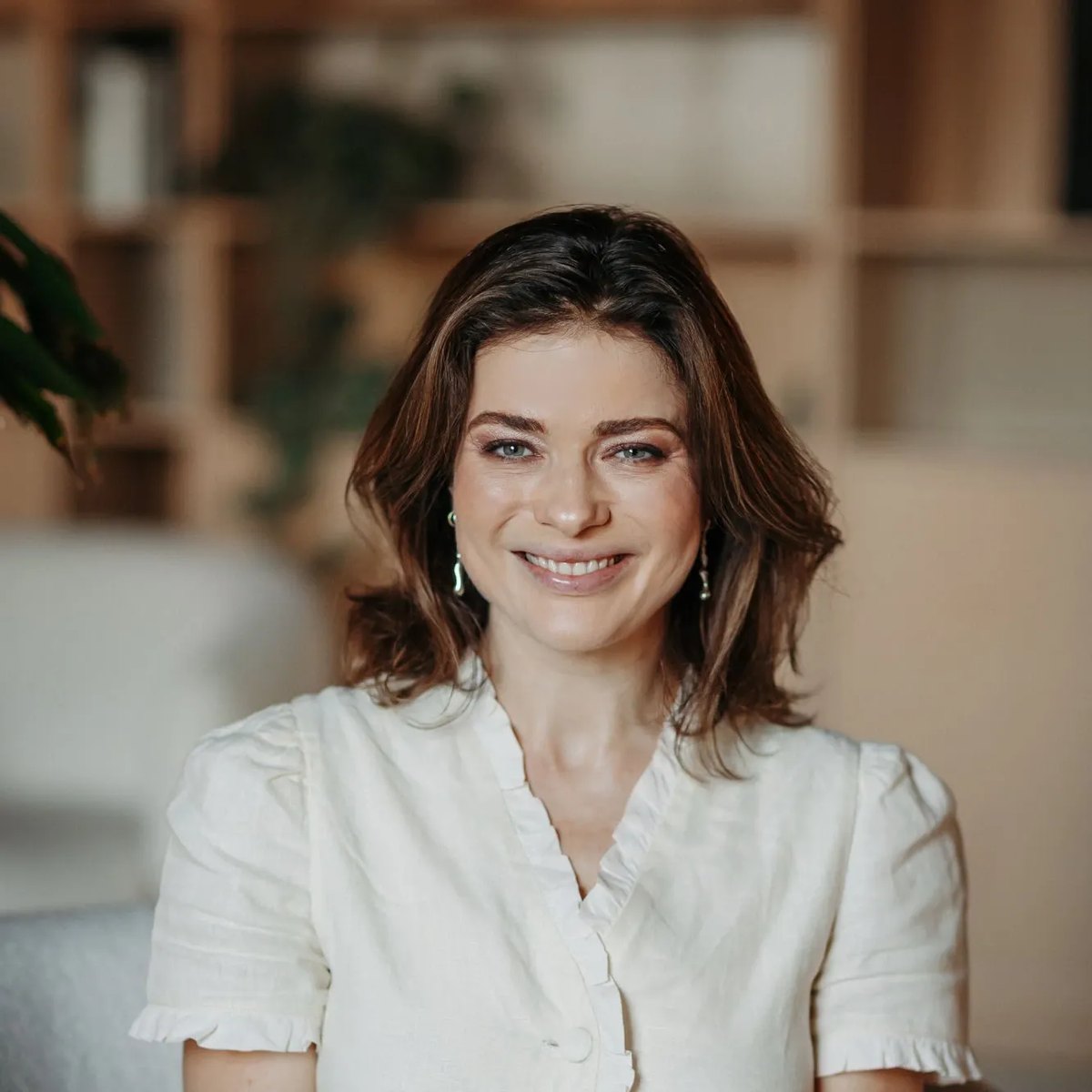 Portrait of the general partner, smiling